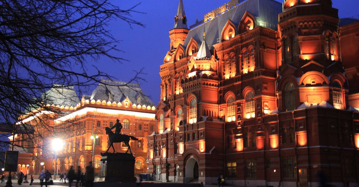Stunning view of Moscow's State Historical Museum with vibrant night lights and architecture.