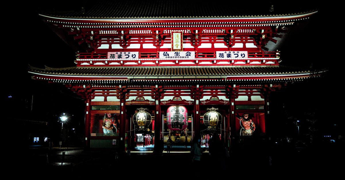 A captivating night photograph of the iconic Senso-ji Temple in Tokyo, Japan, illuminated beautifully.