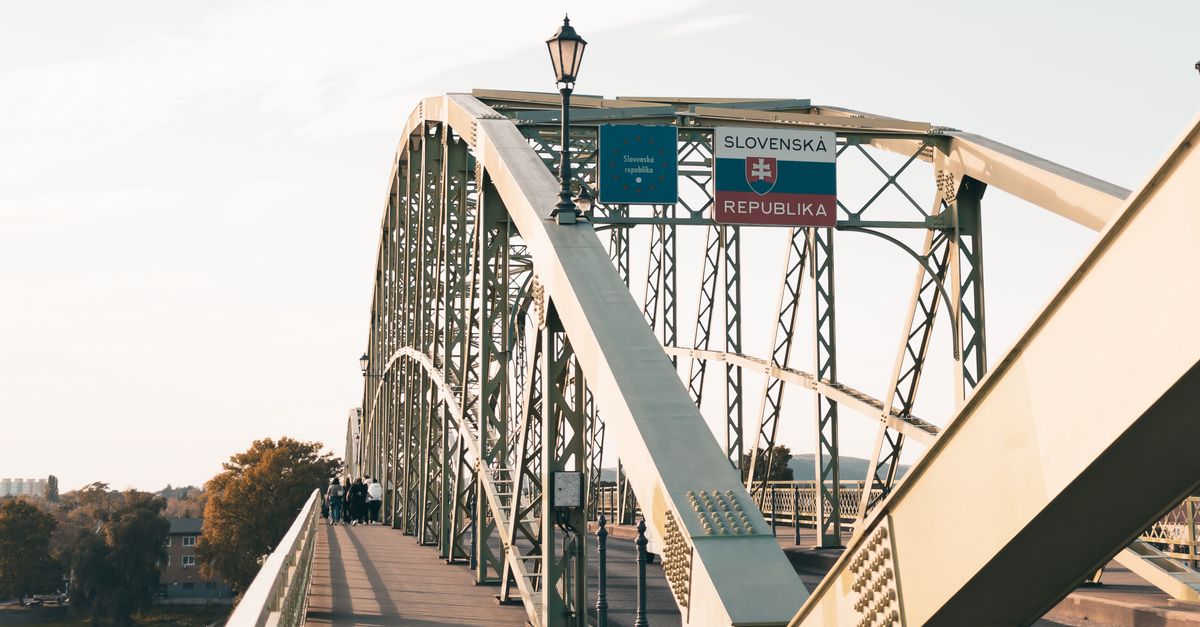 A scenic view of Maria Valeria Bridge connecting Hungary and Slovakia over the Danube River.