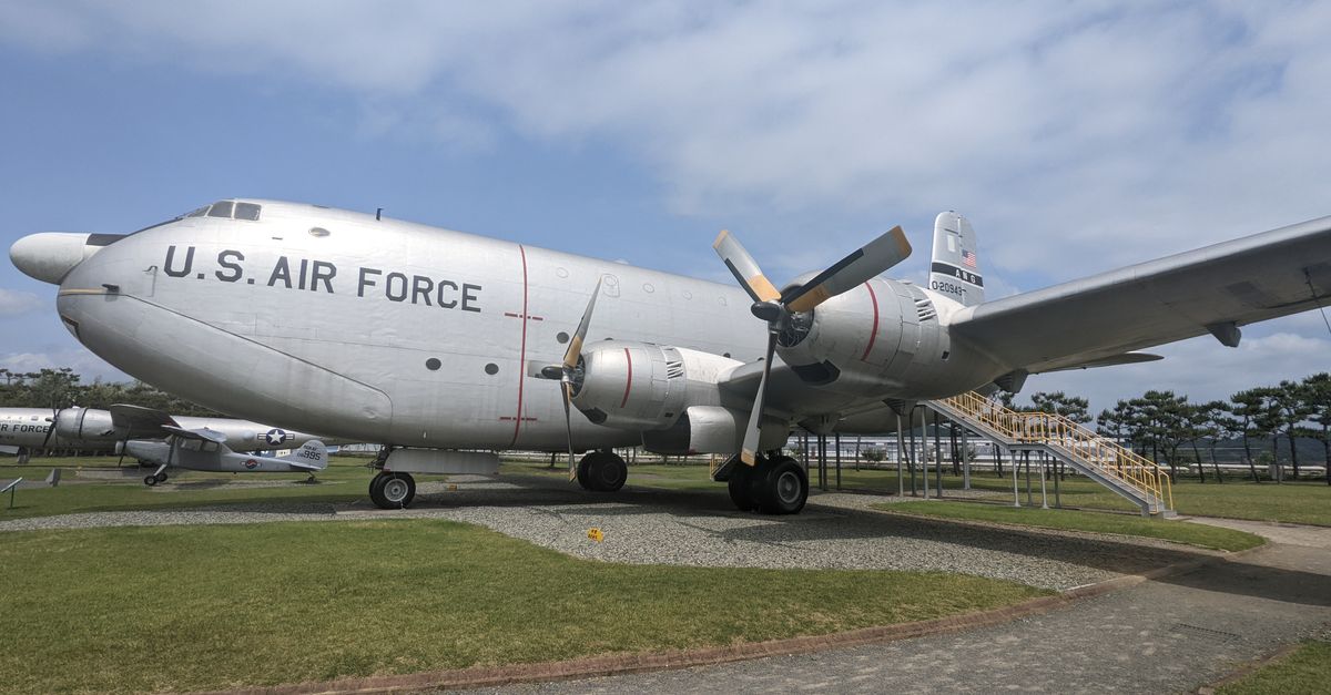 Large U.S. Air Force cargo plane displayed outdoors on a sunny day.