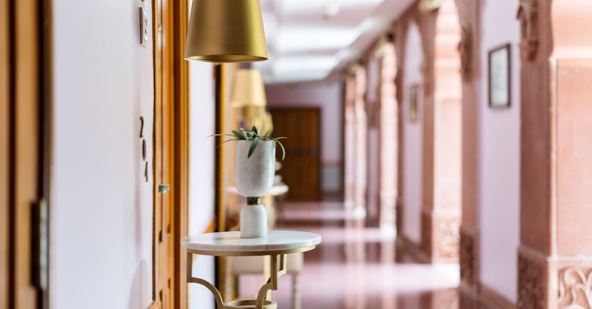 Elegant corridor of a heritage hotel in Bikaner, showcasing Indian architectural charm and luxury design.
