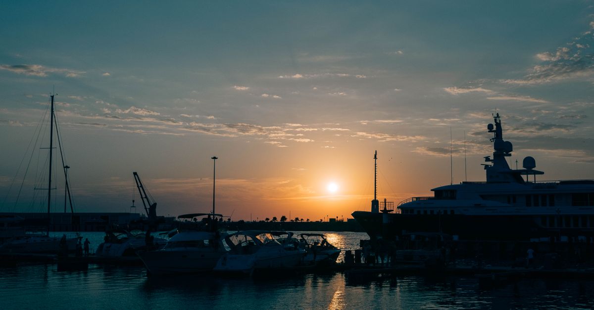 Beautiful sunset view of yachts in the harbor at Sochi, Russia.