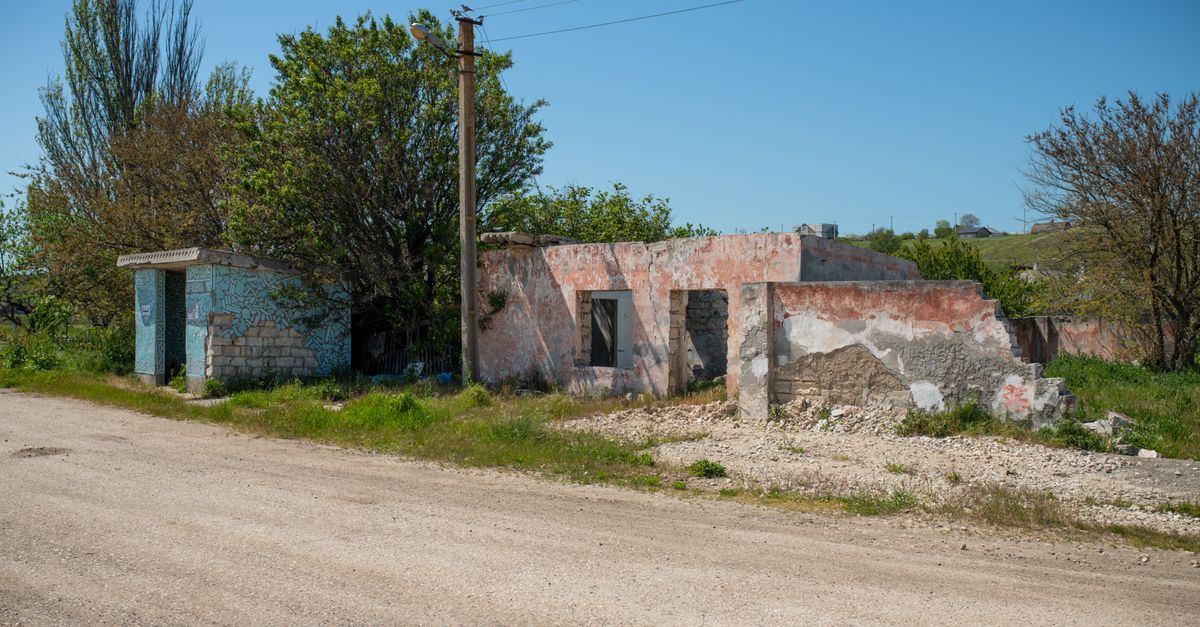Rural abandoned buildings in Kerch show architectural decay and nature reclaiming space.