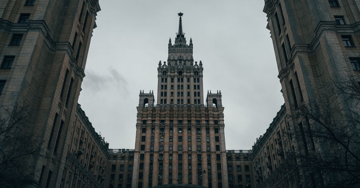 Majestic view of a historic Stalinist skyscraper in Moscow, showcasing Soviet architectural style.