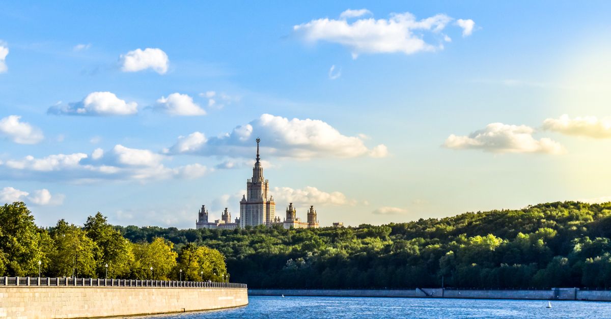 View of Moscow State University and the Moscow River under a clear summer sky.