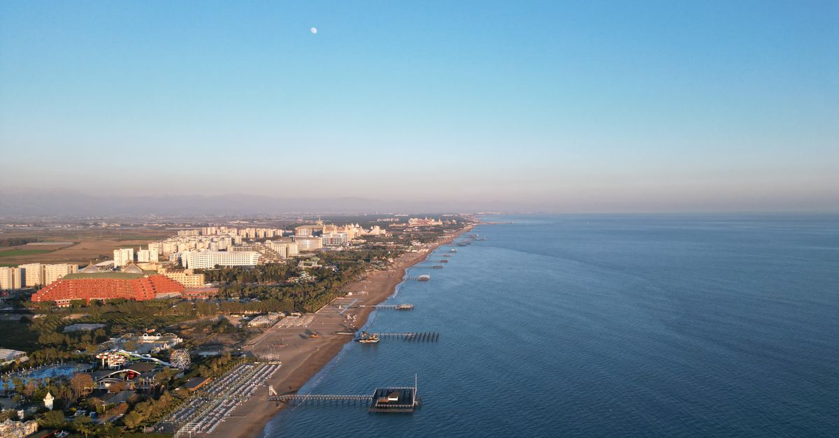 A mesmerizing aerial view of the Aksu coastline and Mediterranean Sea in Antalya, Türkiye at daytime.